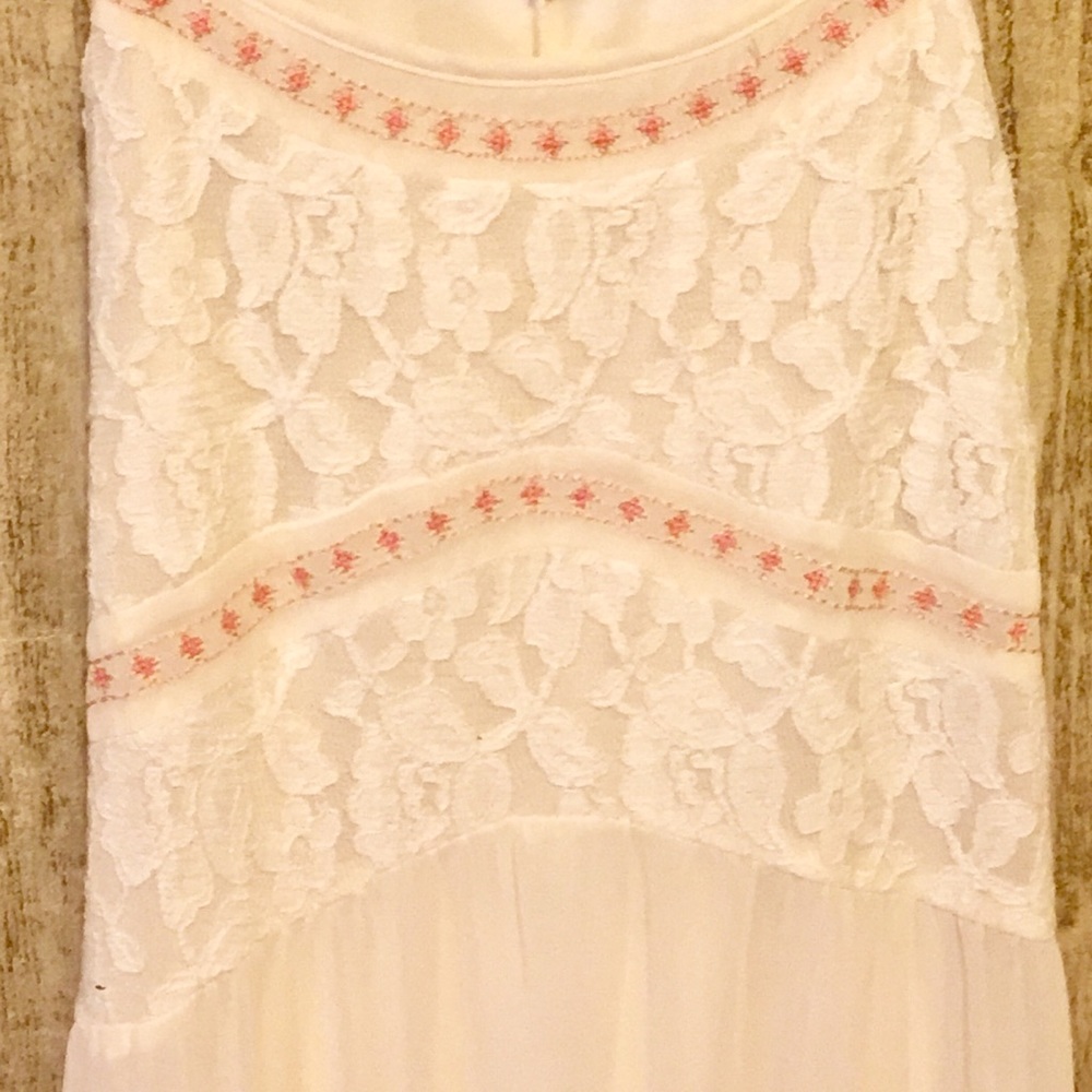 Gorgeous cream colored long flowing dress